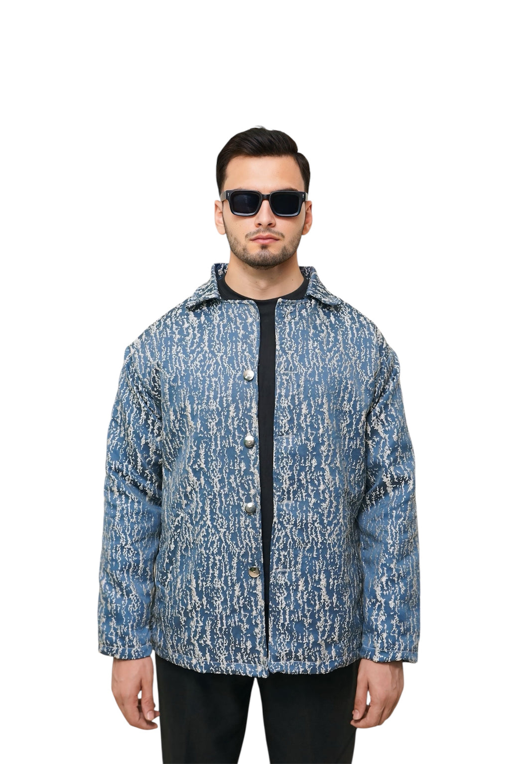 Man wearing a blue patterned jacket and sunglasses on a white background