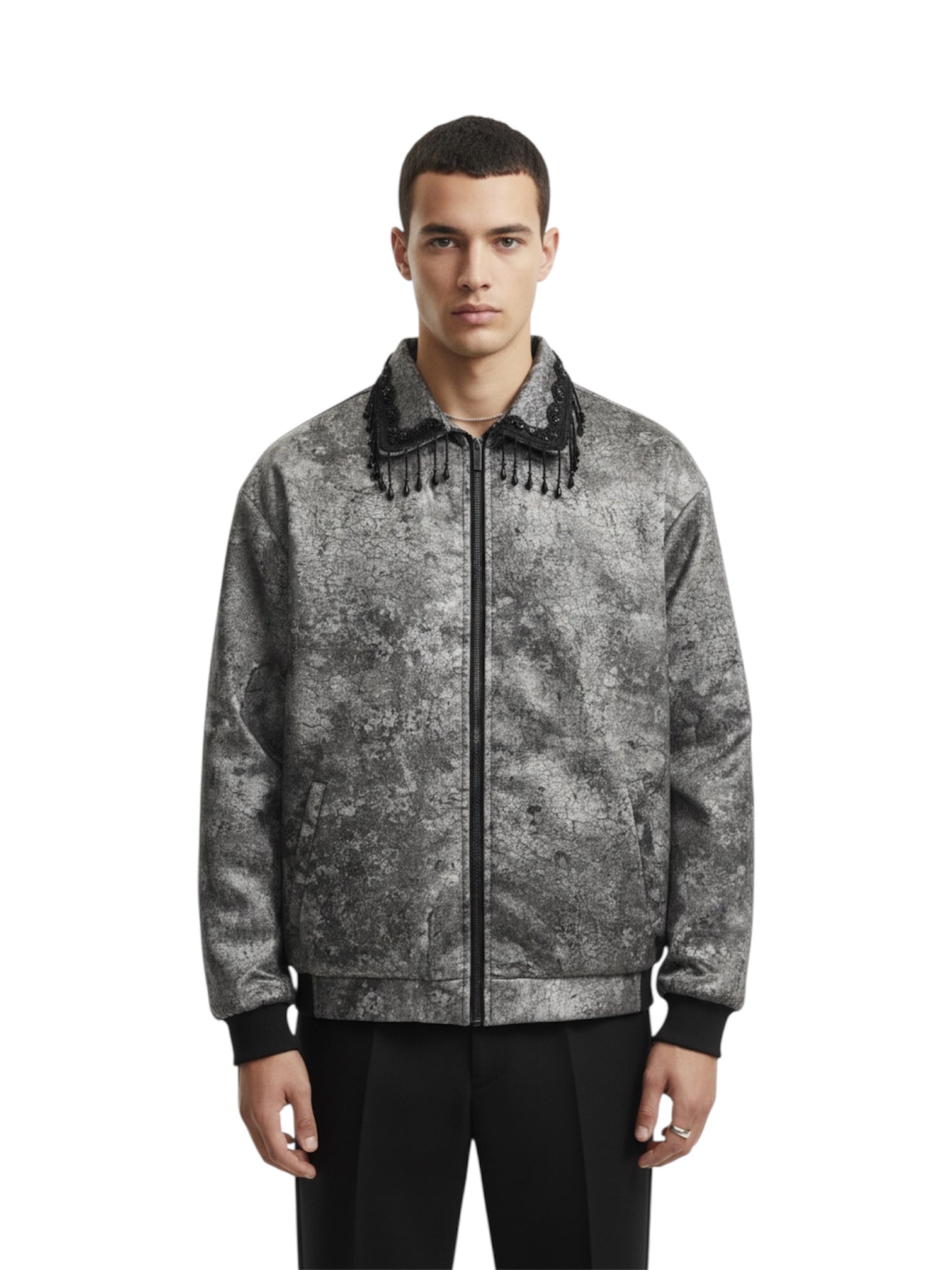 Man wearing a gray patterned jacket on a white background