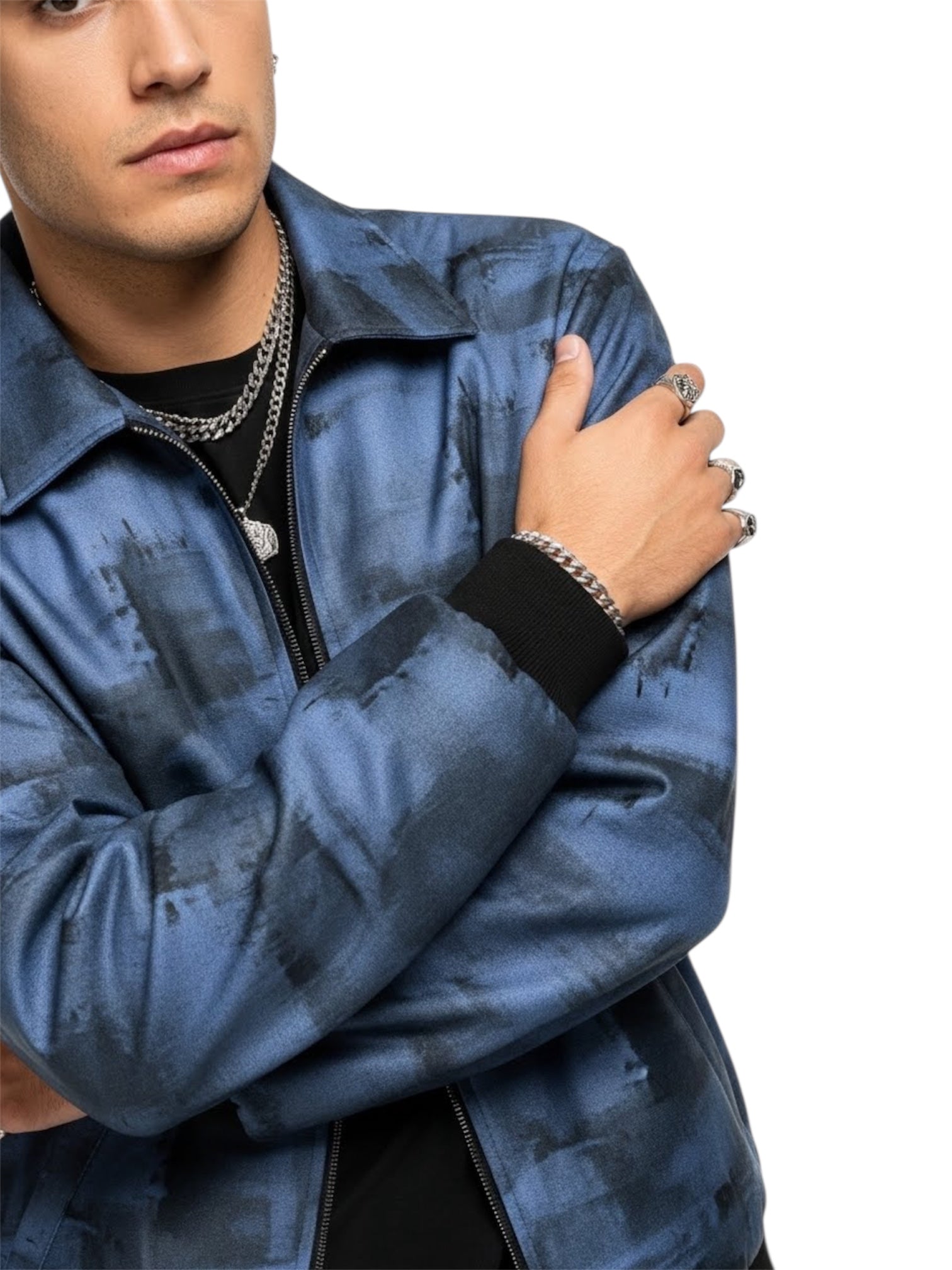 Person wearing a blue jacket with a white background